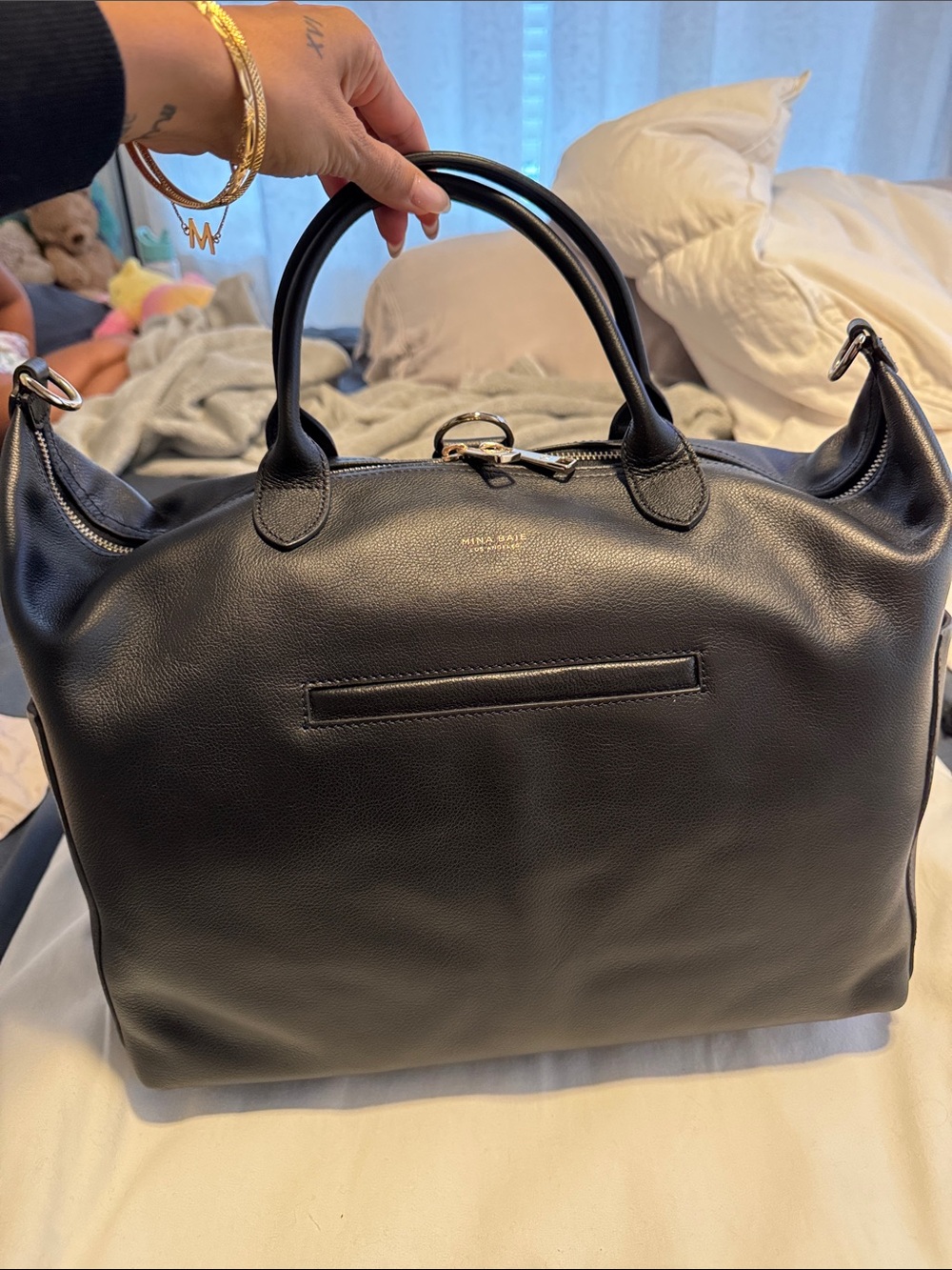 Mina Baie black leather emmy full size very gently used